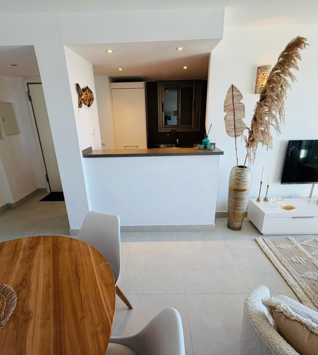 Resa Estates Ibiza Cala Tarida sea views apartment te koop living and kitchen.jpeg